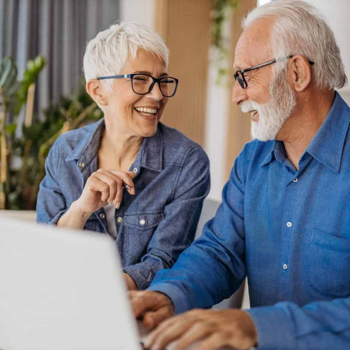 Talco Precious Metals IRA & Investing Company Copy of Senior couple at laptop smiling GettyImages 1323096524 1200x1200 1