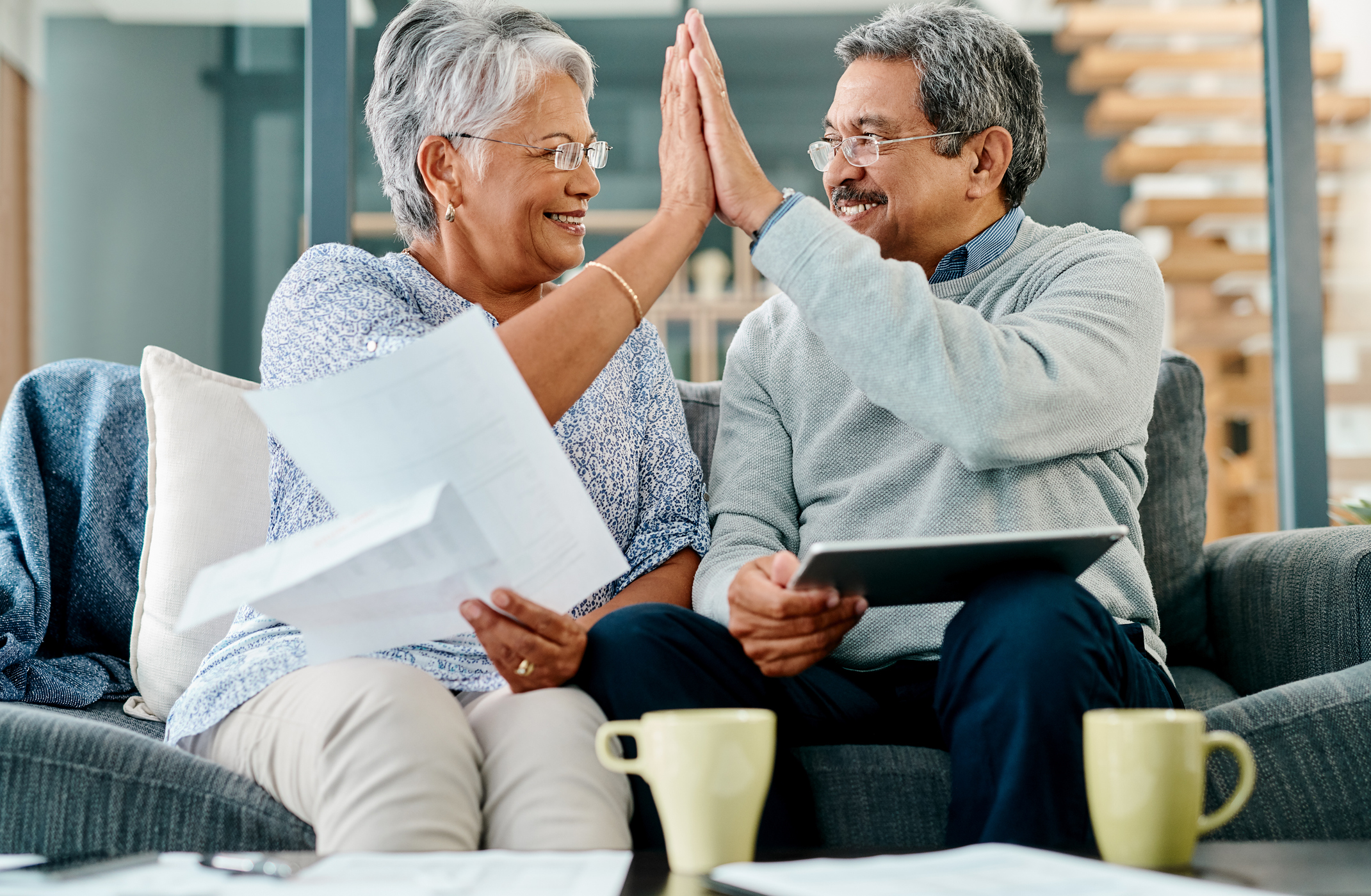 Dunn Gold IRA Investing Company getty couple high five happy